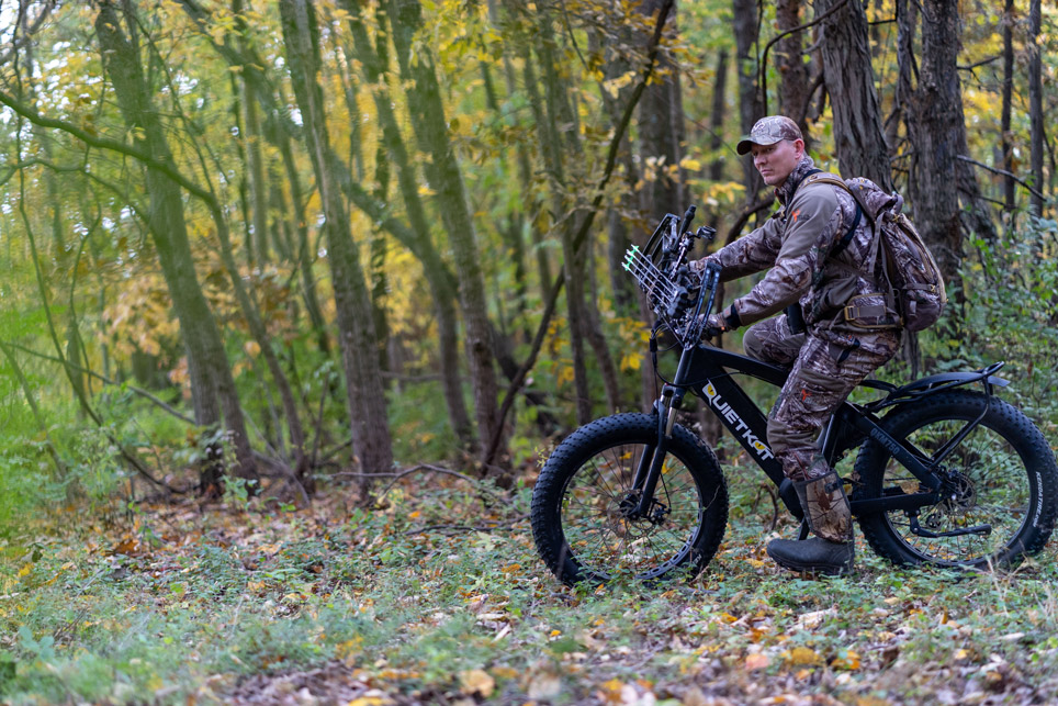 Hunter stealthily riding an eBike