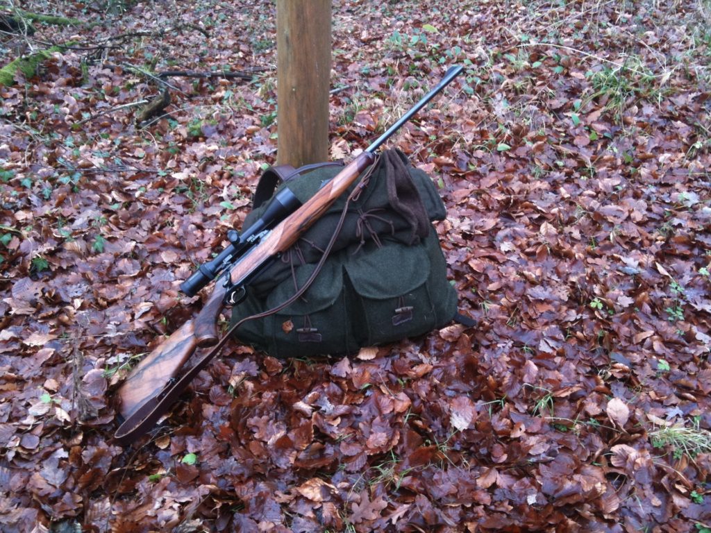 hunting-backpack-and-a-rifle