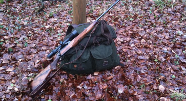 hunting-backpack-and-a-rifle