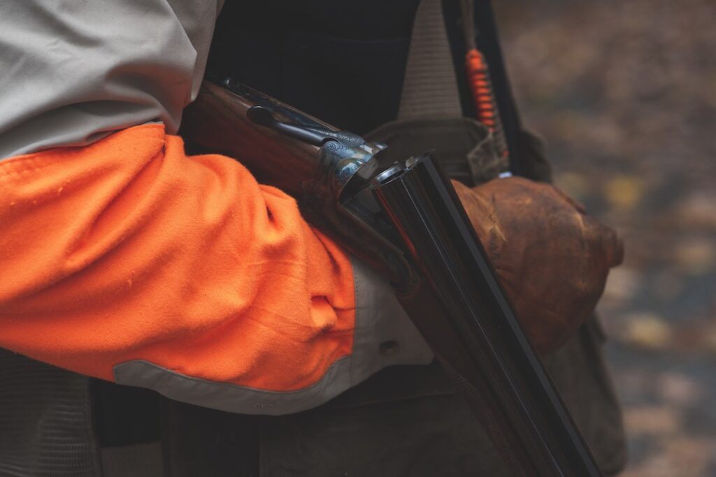 wearing-a-camo-and-orange-clothing