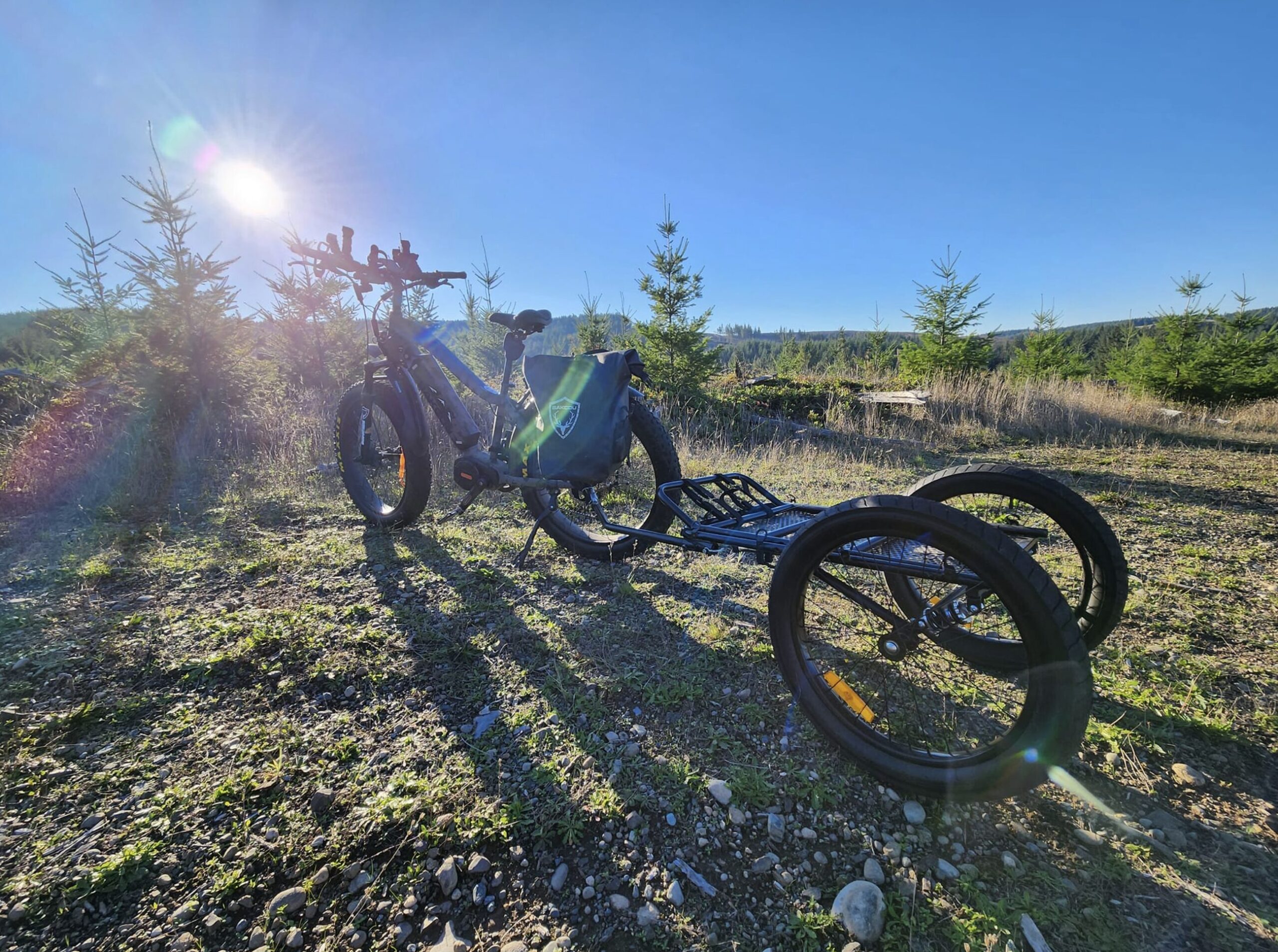 Bakcou Mule electric hunting bike with attached trailer on trail